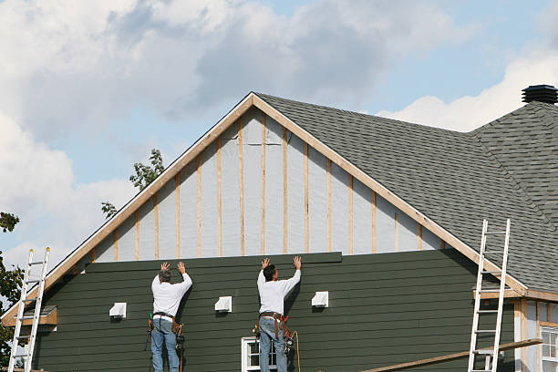 Professional Siding Contractor technician working in Winthrop, MA